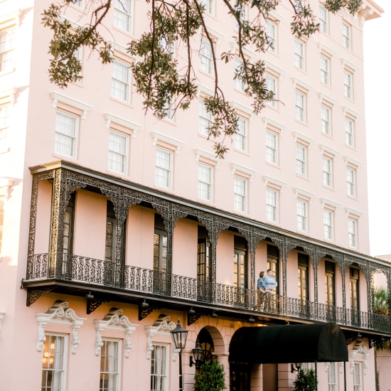 Balcony over pink building