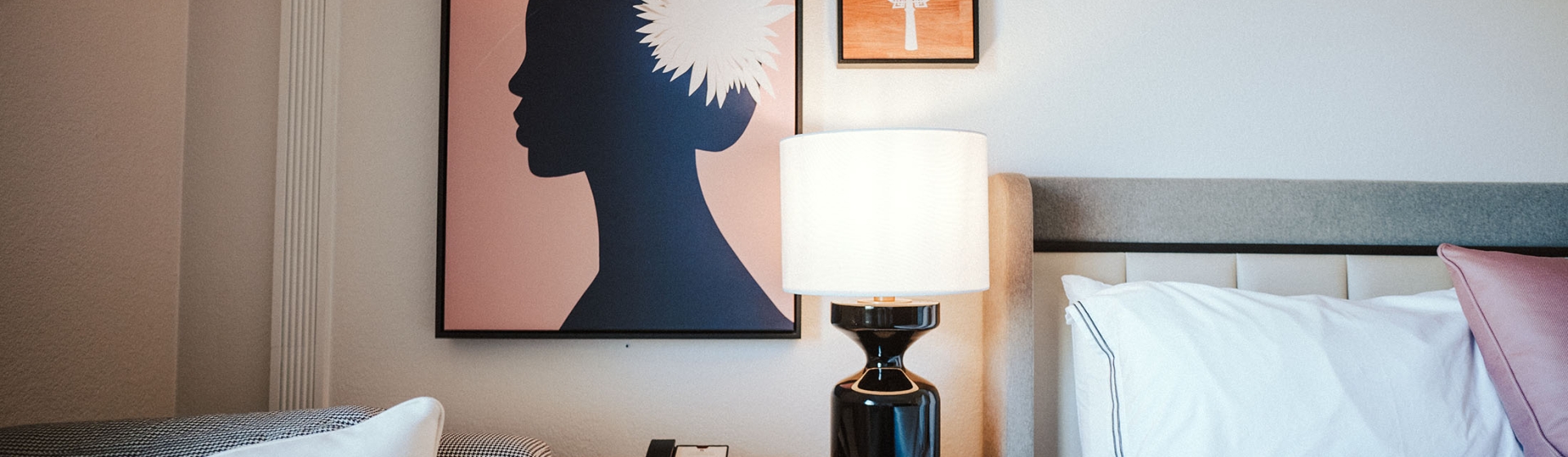 Hotel room with wall art on wall