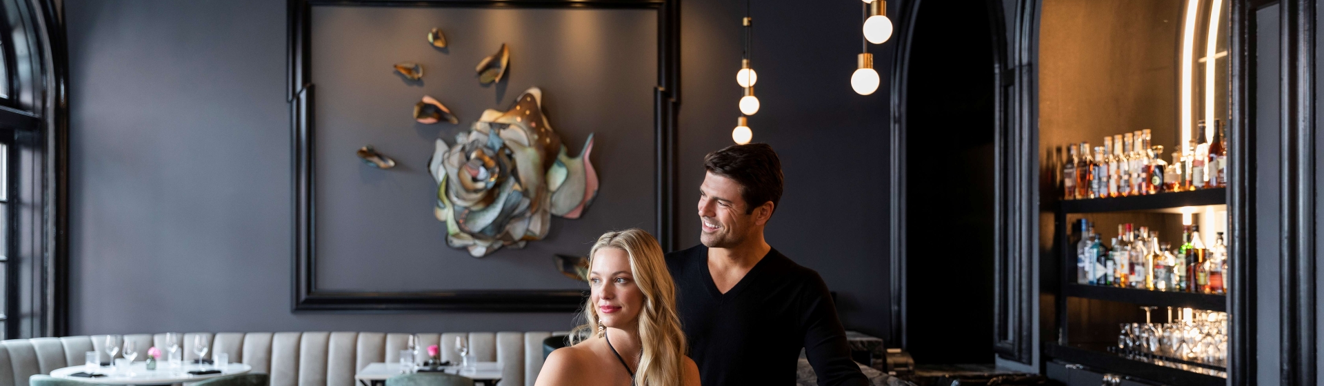 Couple Sitting at The Bar