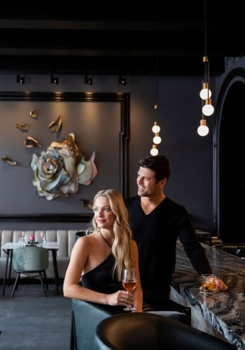 Couple Sitting at The Bar