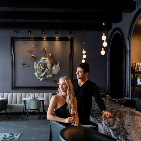 Couple Sitting at The Bar