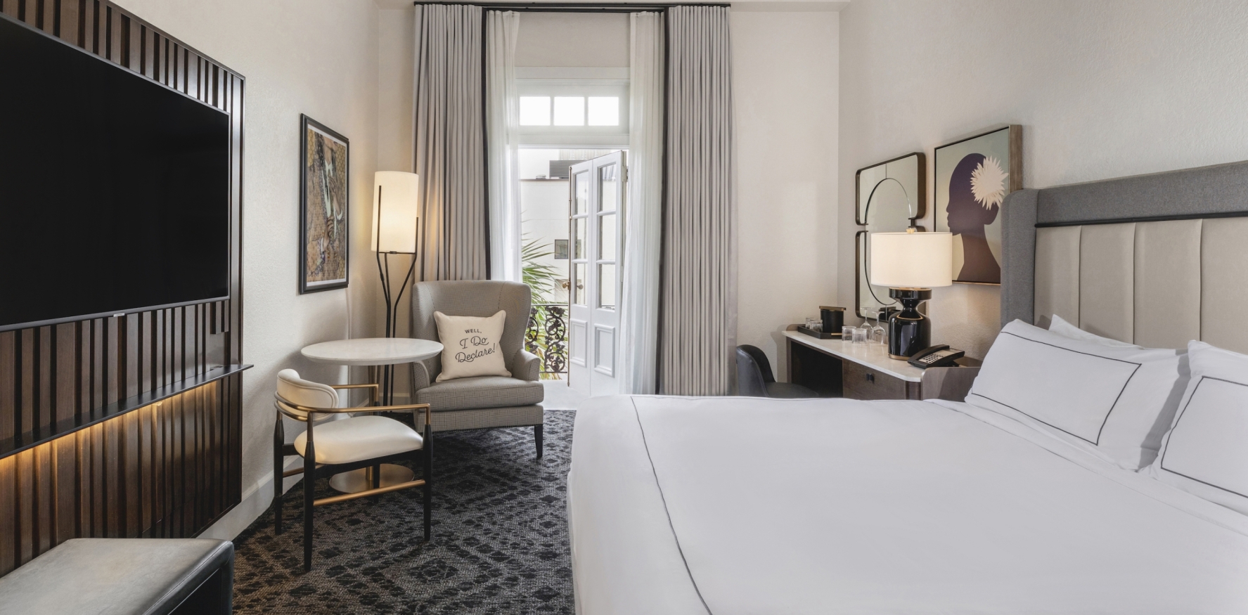 Room with Open Door Leading to Balcony